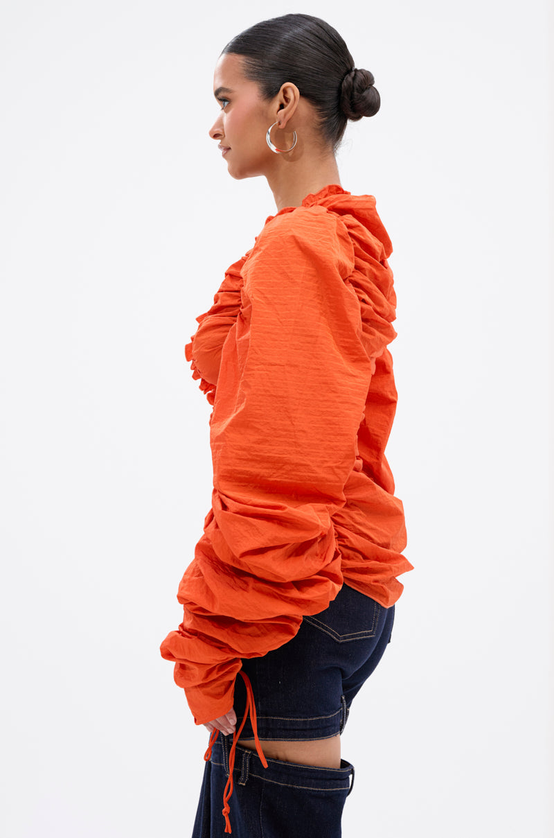 IN IT TO WIN IT RUCHED BLOUSE
