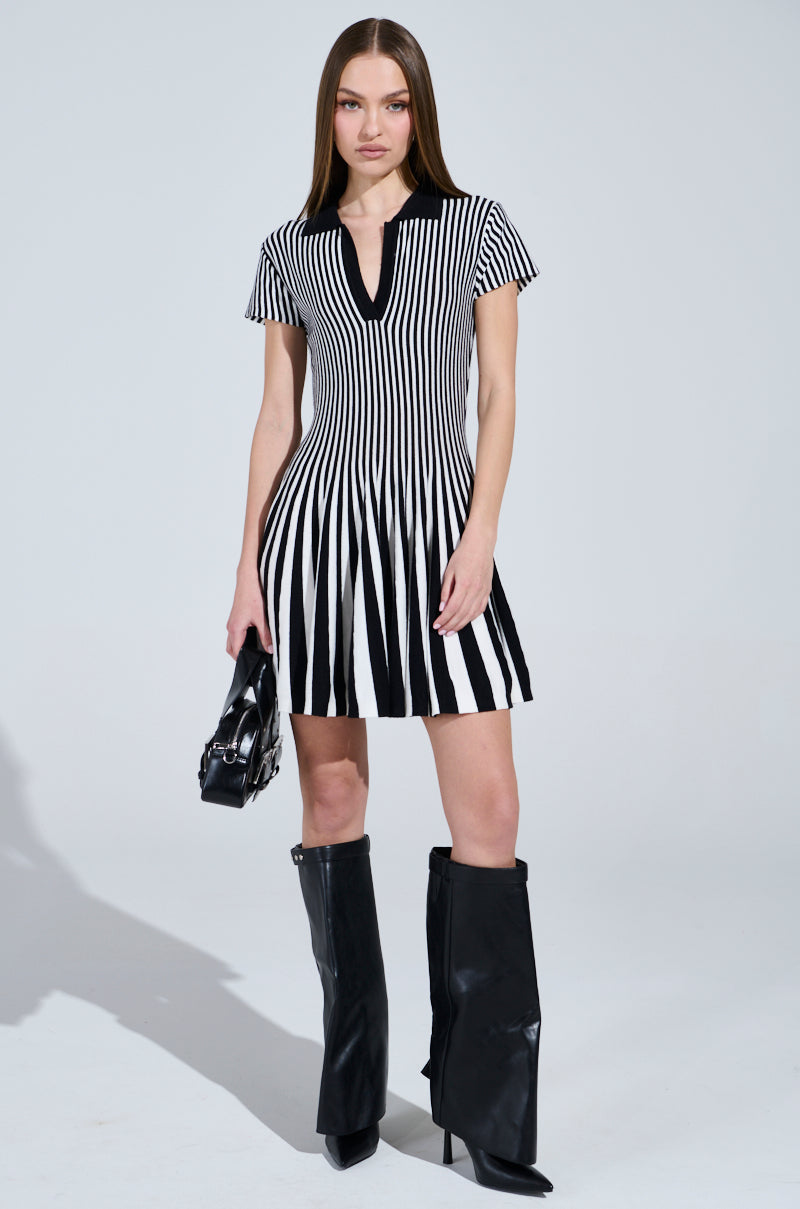 ALINA PLEATED KNIT FIT AND FLARE MINI DRESS IN BLACK AND WHITE